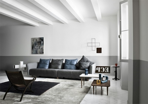white flooring shaggy carpet gray sofa black armchair