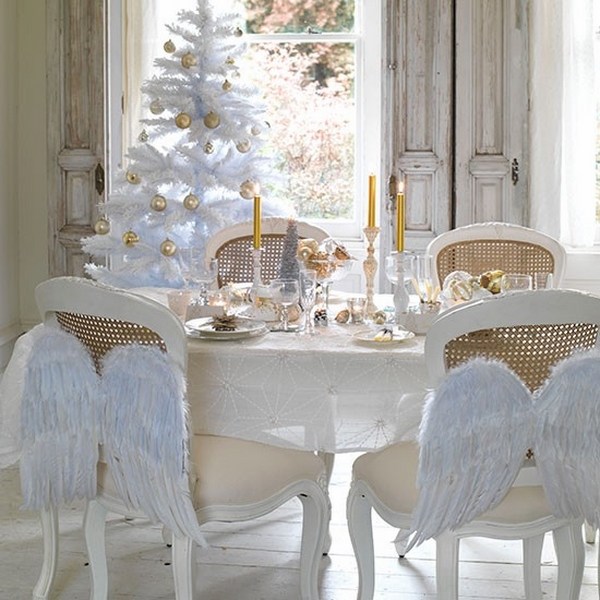 white gold Christmas table decoration ideas angel wings chair 
