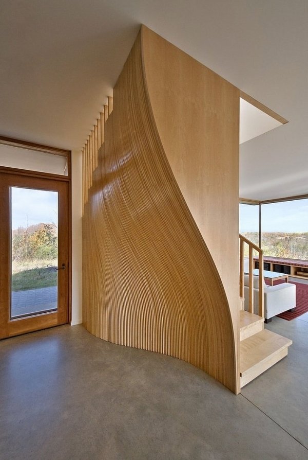 House entry sculptural wood wave form modern staircase ideas