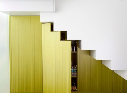 creative-under-stairs-cupboard-ideas-green-wood-finish