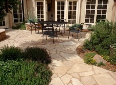 modern-patio-design-stone-pavers-wrought-iron-garden-furniture