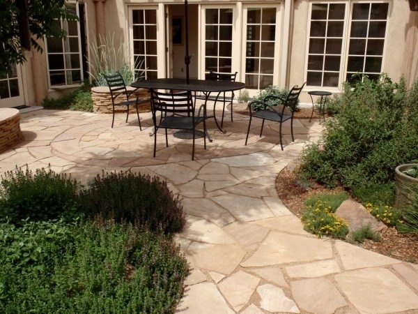 patio design stone pavers wrought iron garden furniture