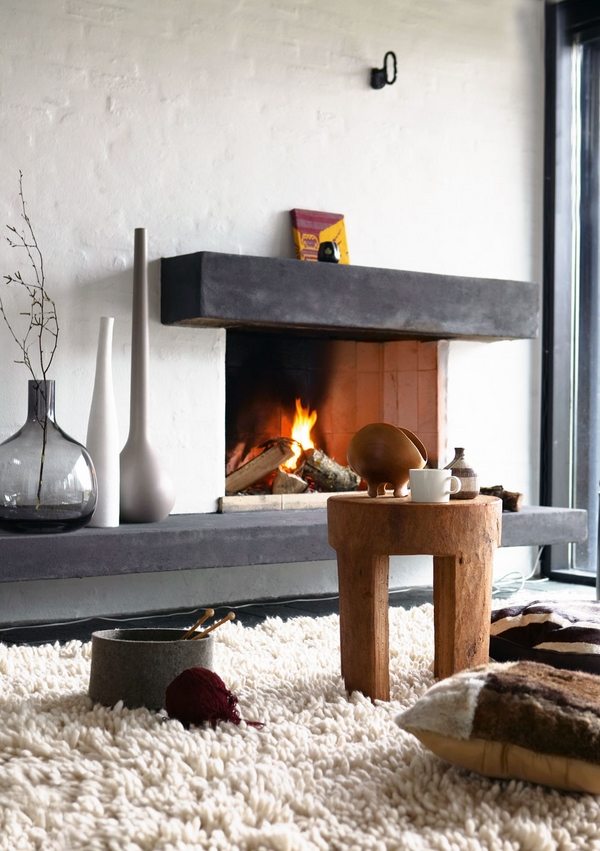 modern-rustic-interior fireplace-rug-wooden-stool