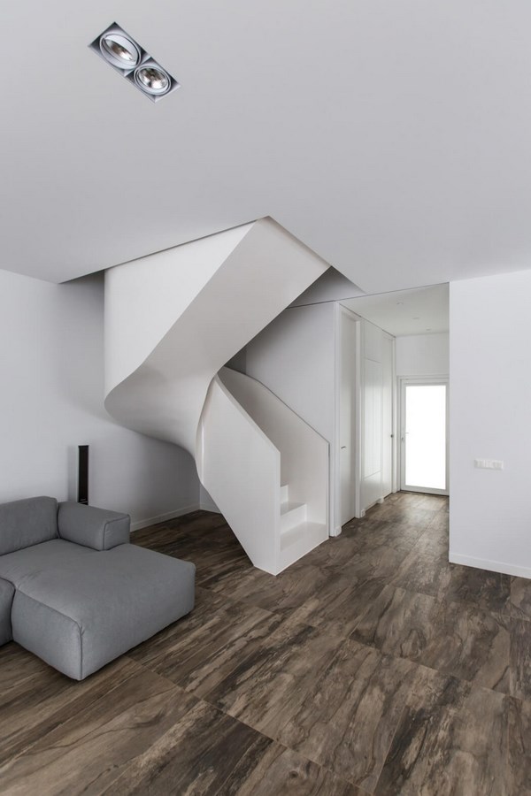Pavilny-Residence-minimalist-black-and-white-interior-design-sculptural staircase