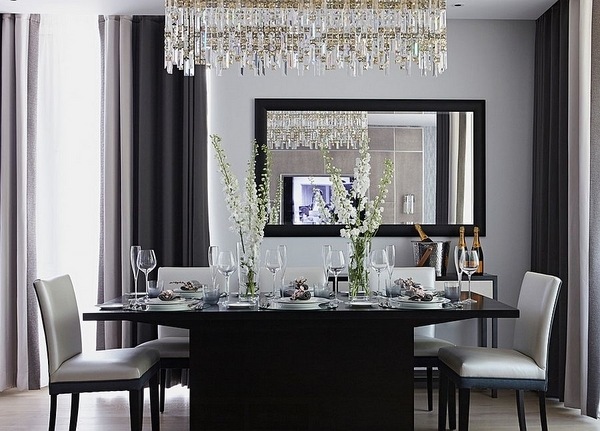 Sophisticated dining room and gray crystal chandelier