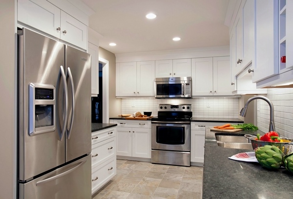 White-kitchen-cabinets-gray-granite-countertops-stainless-steel 
