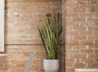 apartment-renovation-Bourgeois-Lechasseur-Architects-preserved-brick-wall-in-living-area