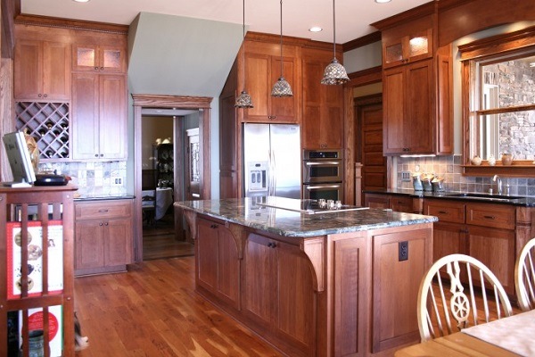 beautiful craftsman kitchen wood cabinets granite countertops wood flooring
