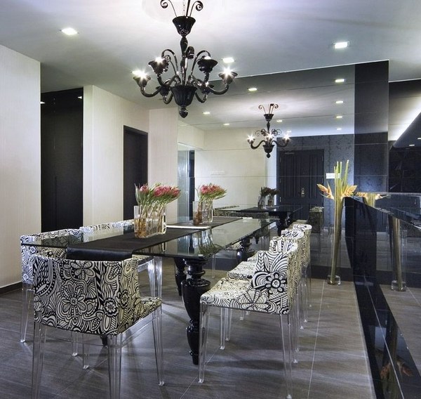 black dining table glass top black chandelier mirror wall
