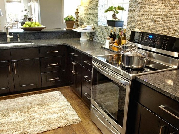 black kitchen cabinets gray granite countertops stainless steel stove