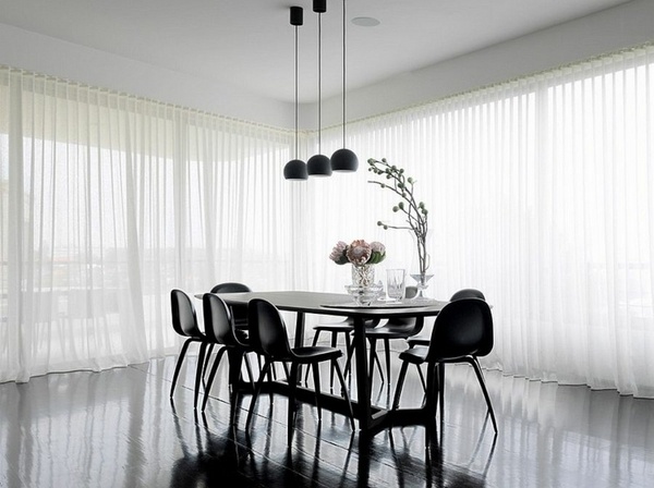 contemporary black dining room large windows mini pendant lamps black chairs