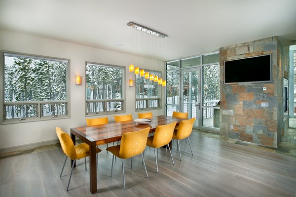 dining room design-grey-hardwood-floor yellow chairs
