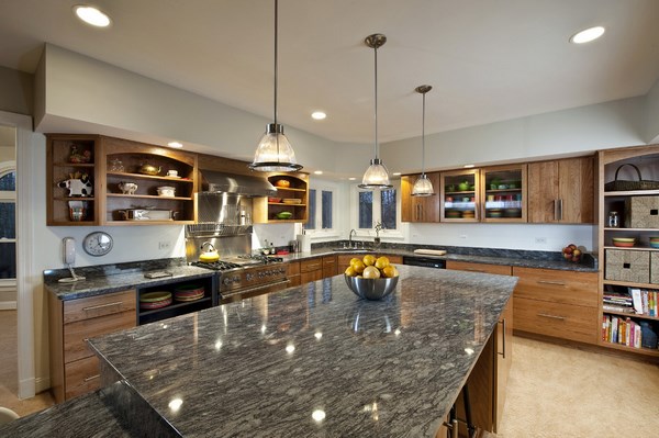 grey granite countertops with brown cabinets