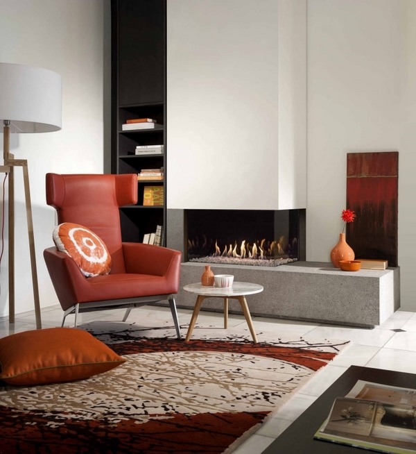 contemporary indoor fireplace ideas gas fireplace red armchair