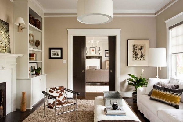 elegant living room interior brown beige colors cowhide armchair beige shaggy rug