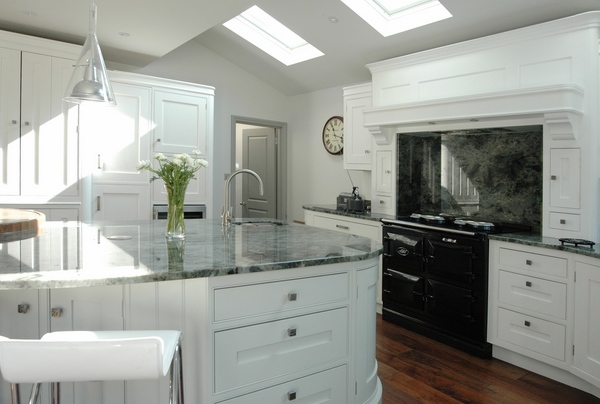 gray-granite-countertops-white-wooden-cabinets-skylights-modern-kitchen
