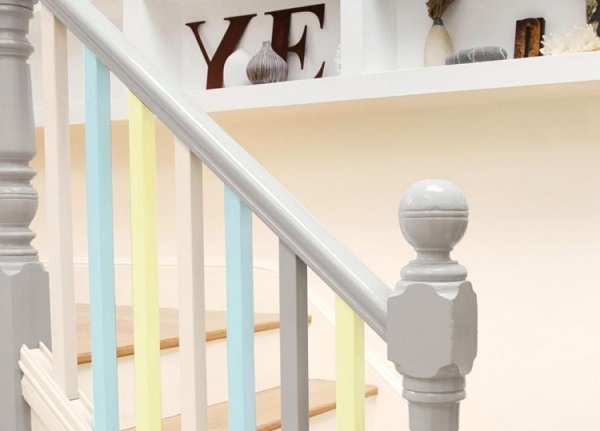 interior staircase wood stairs wood railings pastel colors
