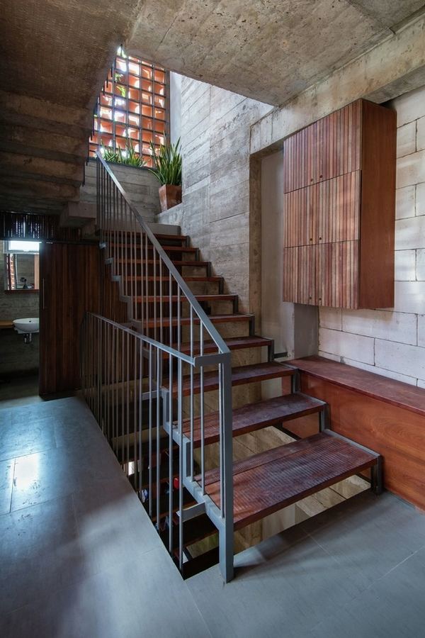 interior staircase design ideas metal railings concrete walls