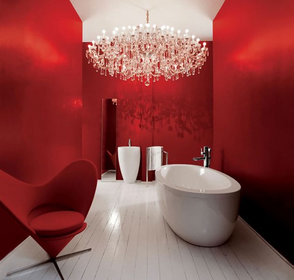 luxury bathroom red wall color white tub crystal chandelier