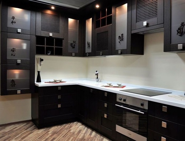 modern black kitchen white countertops and backsplash accent lights glass fronts 
