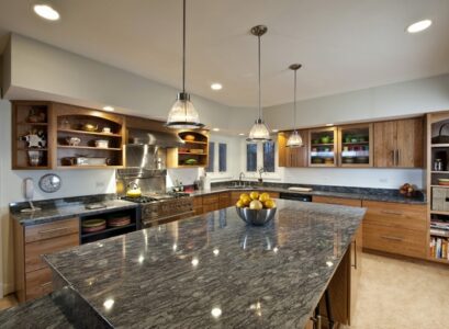 modern-kitchen-design-gray-granite-countertops-wood-cabinets