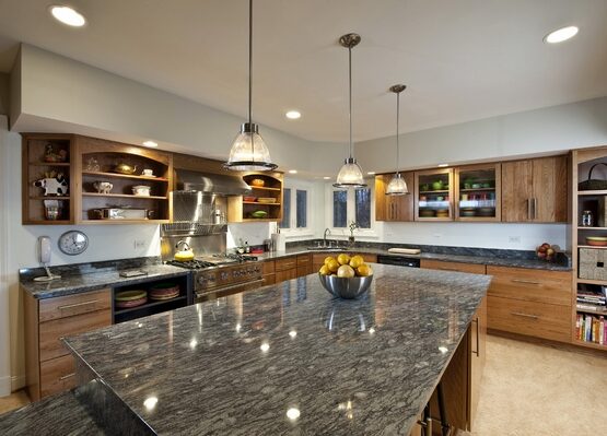 modern-kitchen-design-gray-granite-countertops-wood-cabinets