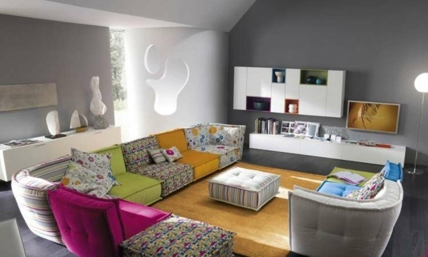modern living room design gray walls corner sofa colorful pattern 