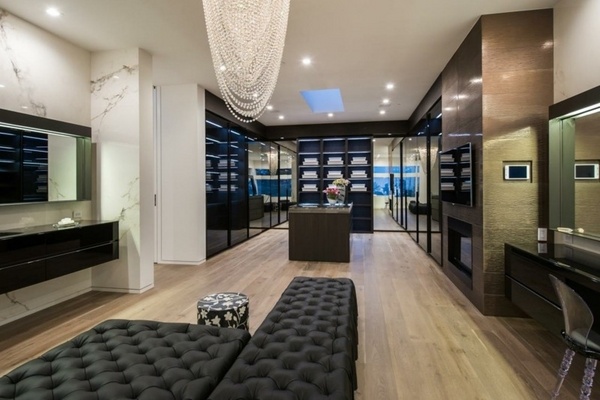 modern-walk-in-closet-design-ideas-glass-wardrobe-doors-tufted-ottoman