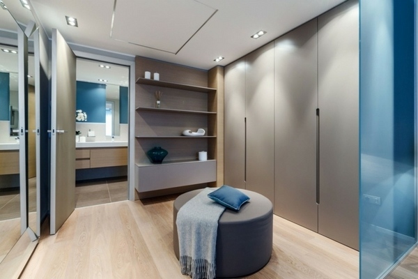modern-walk-in-closet-design-ideas-minimalist-style-wardrobes-shelves-gray-ottoman