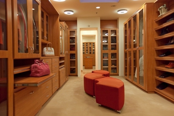 modern -walk-in-closet-design-ideas-wood-furniture-glass-fronts-original-stools