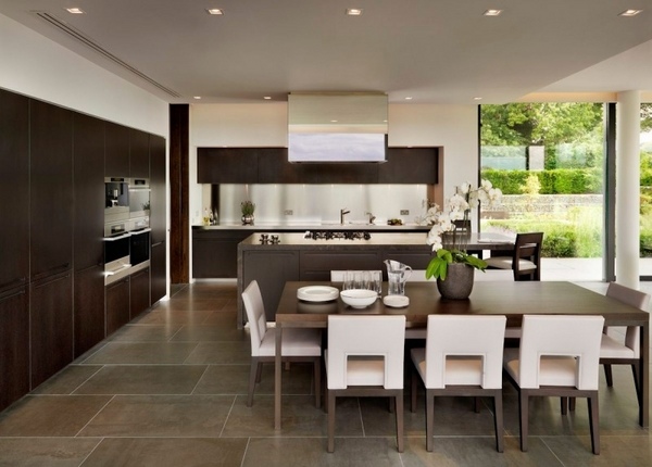 open plan kitchen dining room wood cabinet fronts floor tiles