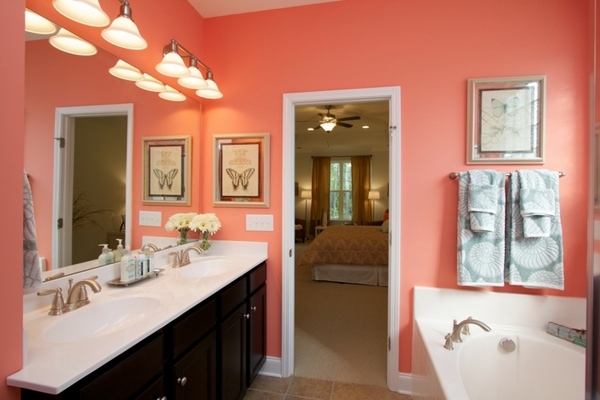 pastel colors olors ideas orange wall color dark wood vanity white countertop