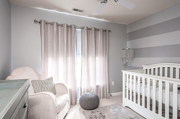 small nursery design white gray colors wall stripes baby cot armchair 