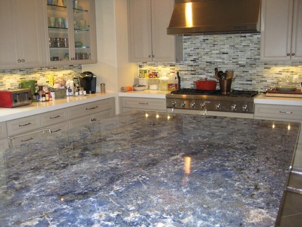 white-kitchen-cabinets-blue-granite-countertop-under-cabinet-lighting