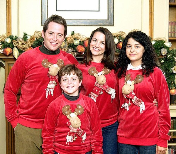 Matthew Broderick and Kristin Davis deck the halls Christmas sweaters reindeer