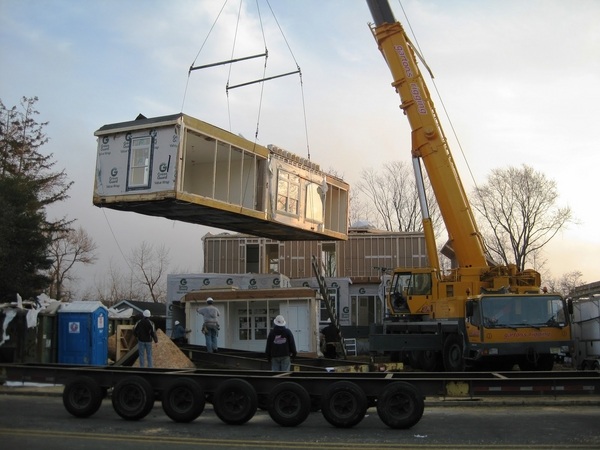 Prefab modern homes construction site assembly