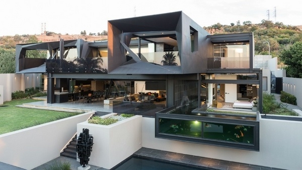 black modern sculptural house  polished contrete flooring contemporary interiros