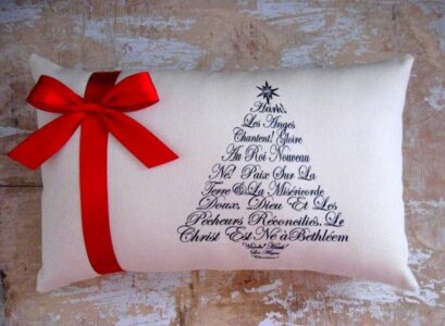 decorative-modern-christmas-pillows-with-text-black-white-red-ribbon