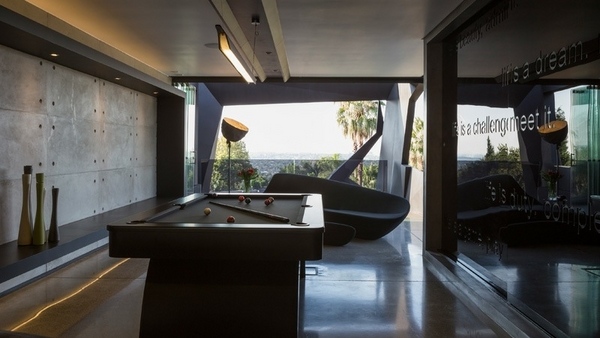 entertainment room pool table concrete wall