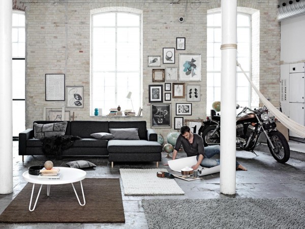 loft brick wall black sofa white coffee table