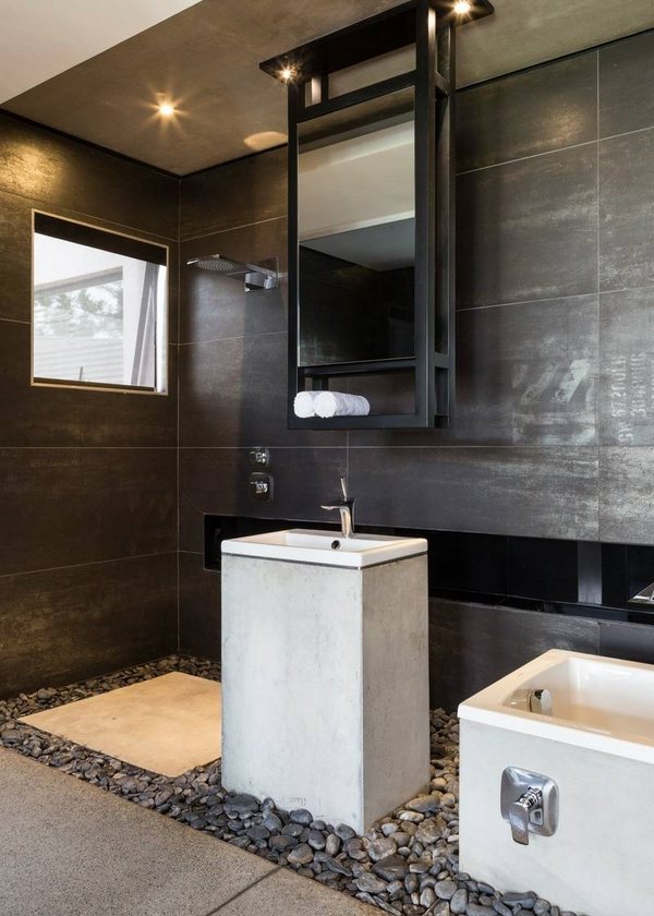 minimalist bathroom pebbles sink gray wall tile