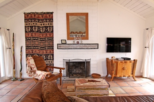 southwestern style living room tile floor fireplace sofa 