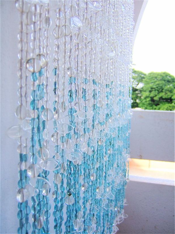 balcony decoration ideas bead curtains white blue beads