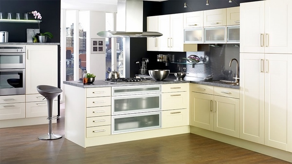 contemporary-kitchen-cream-kitchen-cabinets-gray-countertops-and-backsplash