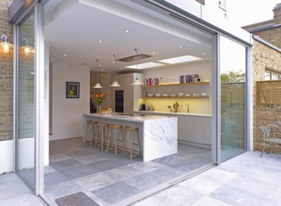 contemporary-kitchen-extension-ideas-glazed-sliding-doors-skylights-modern-lighting