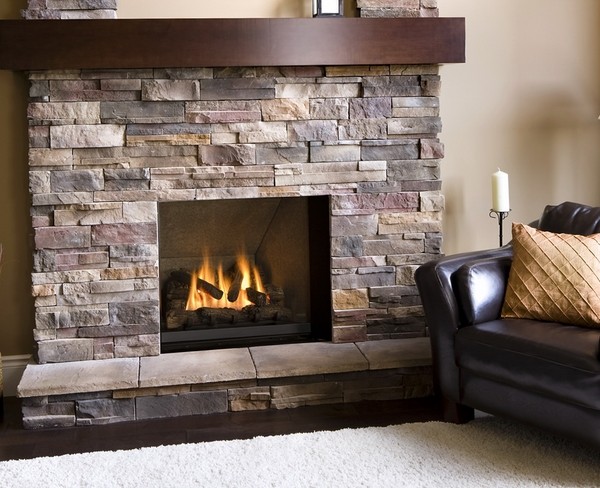 gas fireplace stone veneer wooden mantel
