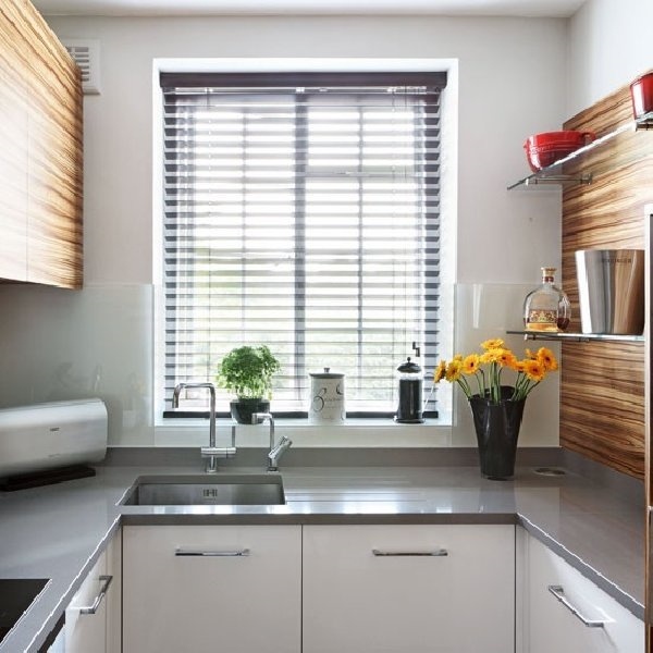 small kitchen white cabinets gray countertop