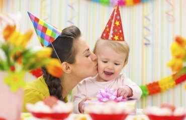 1st-birthday-decorations-paper-hats-colorful-wall-banners