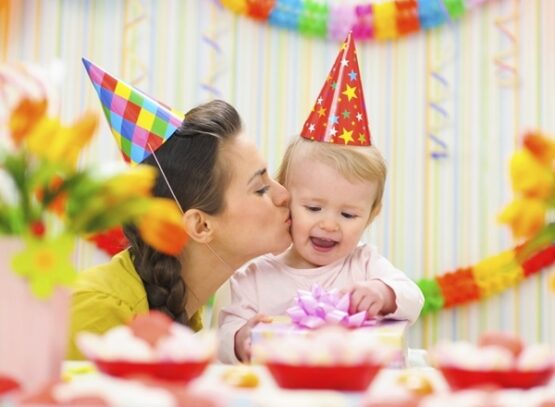 1st-birthday-decorations-paper-hats-colorful-wall-banners