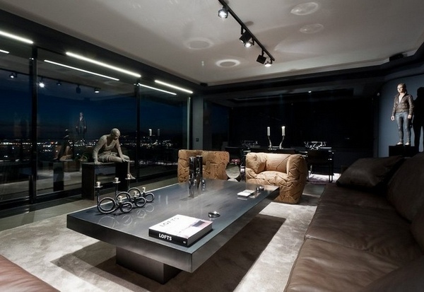 Black-and-grey-living-room-ideas-contemporary-home-interior-glass-wall-brown-armchairs